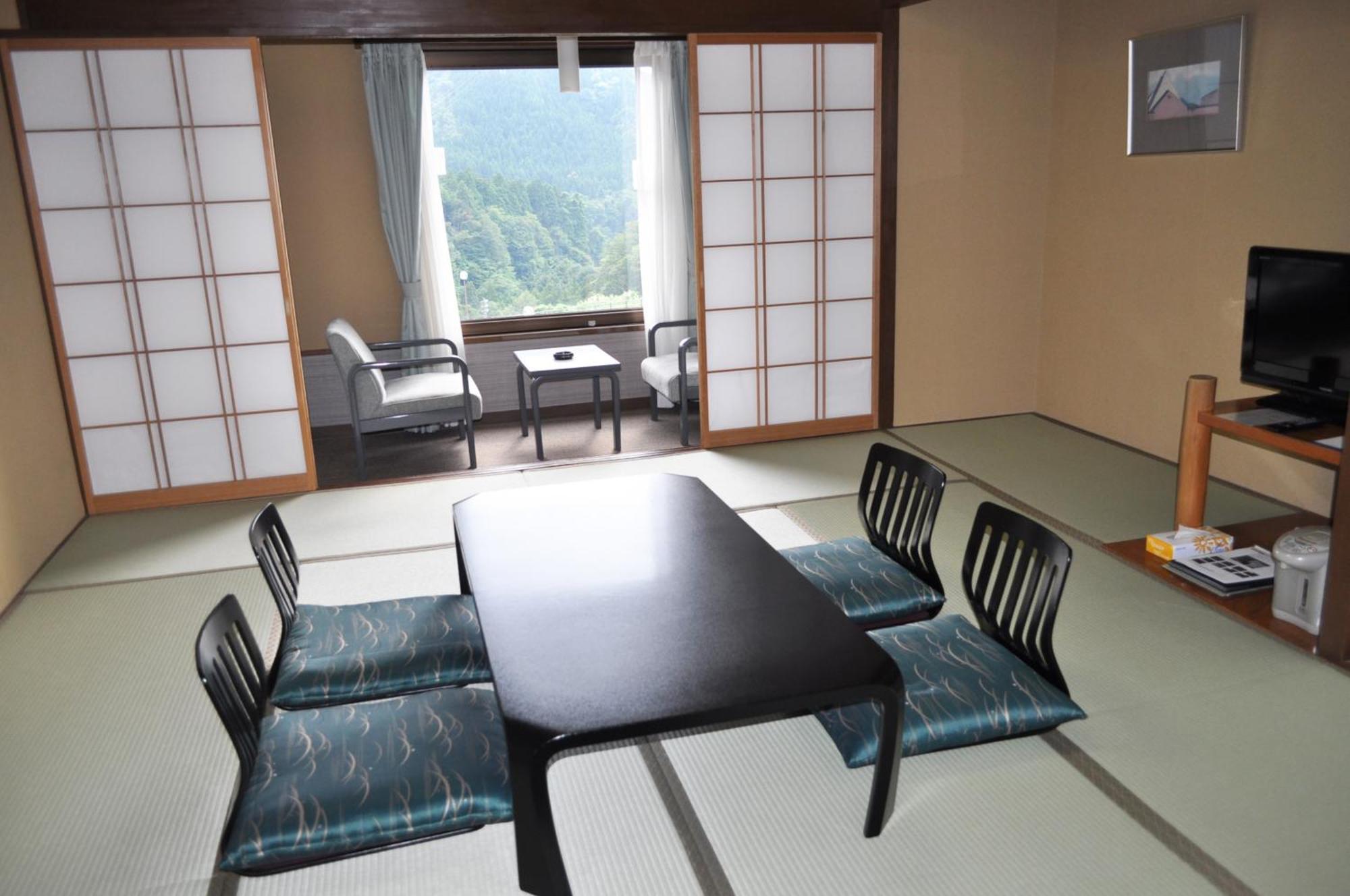 Tateyama Kokusai Hotel Toyama Station Стая снимка